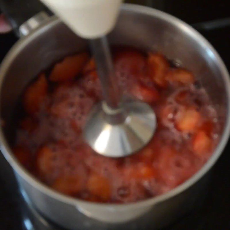 Step 2 Mash the plums Plum Punch