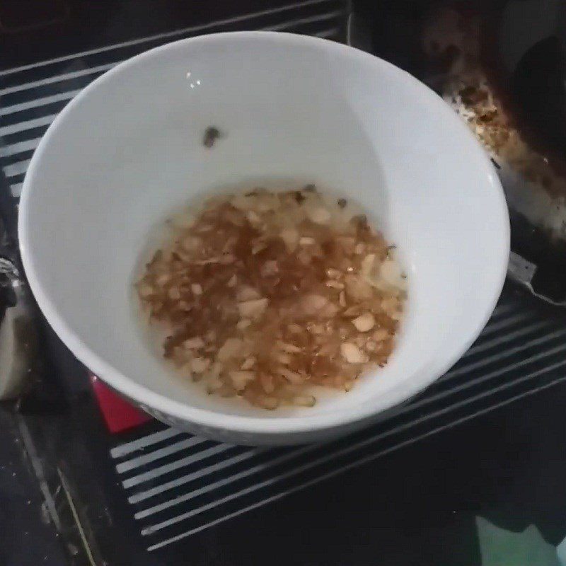 Step 6 Sautéing onions Rice cake from Nghe An