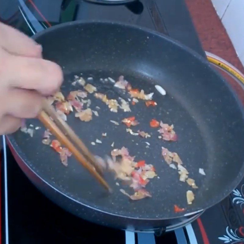 Step 5 Sautéing Onions, Garlic, and Pepper Fried Dried Squid