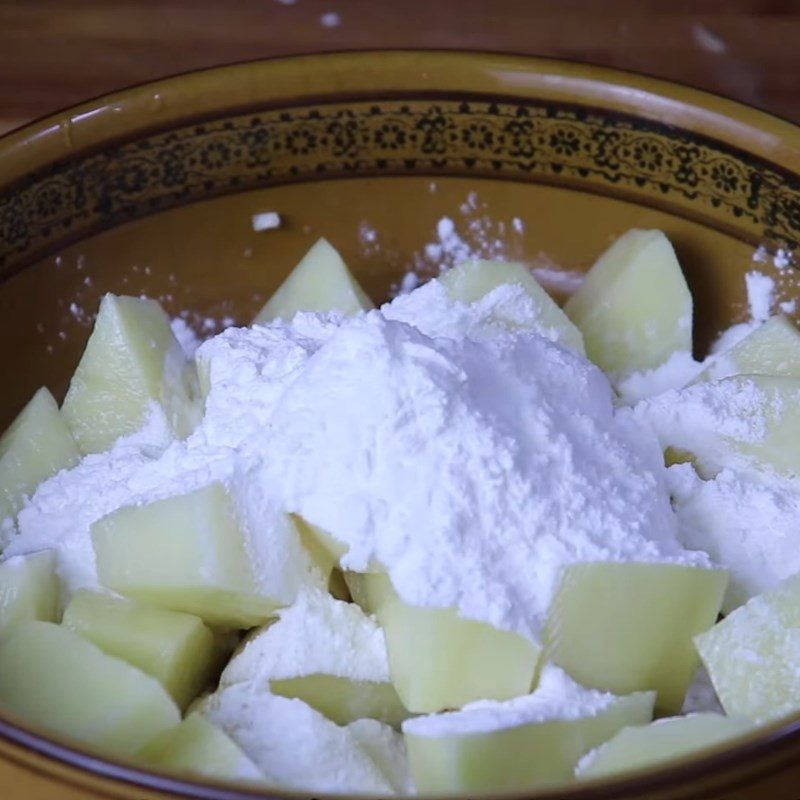 Step 2 Coat with potato starch for Potato Tofu Soup