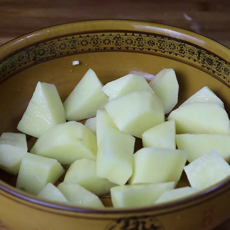 Step 2 Coat with potato starch for Potato Tofu Soup