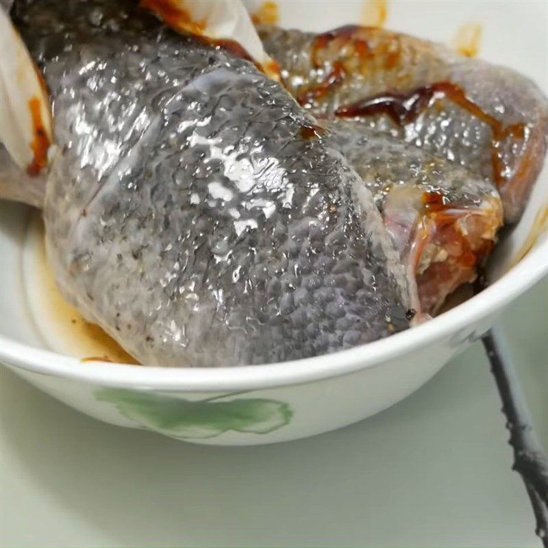 Step 1 Prepare and marinate snakehead fish Braised snakehead fish