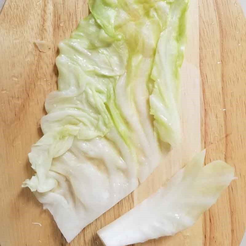 Step 2 Prepare the other ingredients for Cabbage rolls with minced meat, pork bones, and carrots