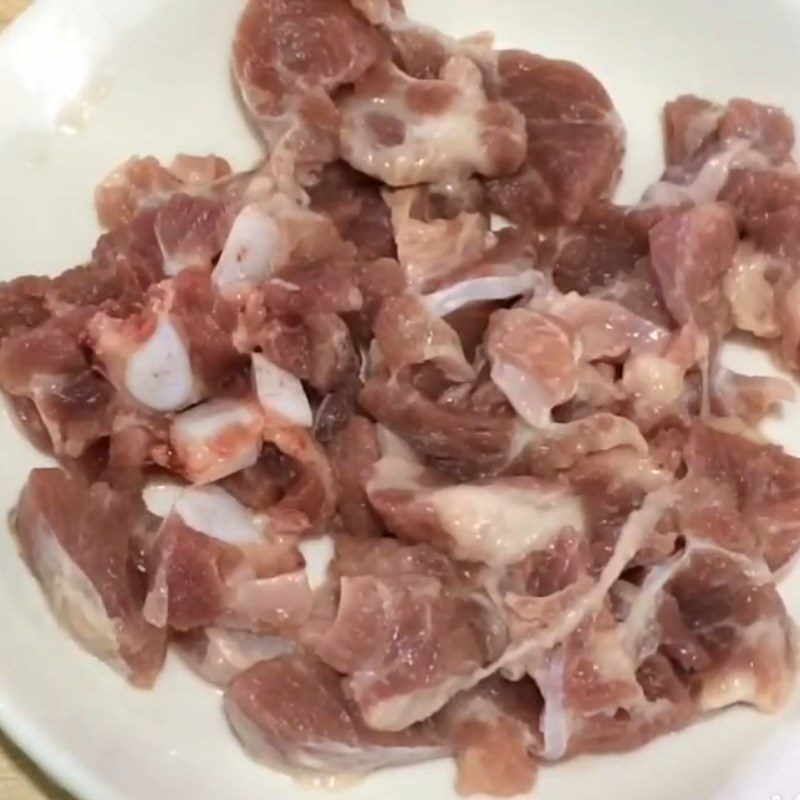 Step 2 Prepare and marinate the pork Stir-fried Pork with Su Su Shoots