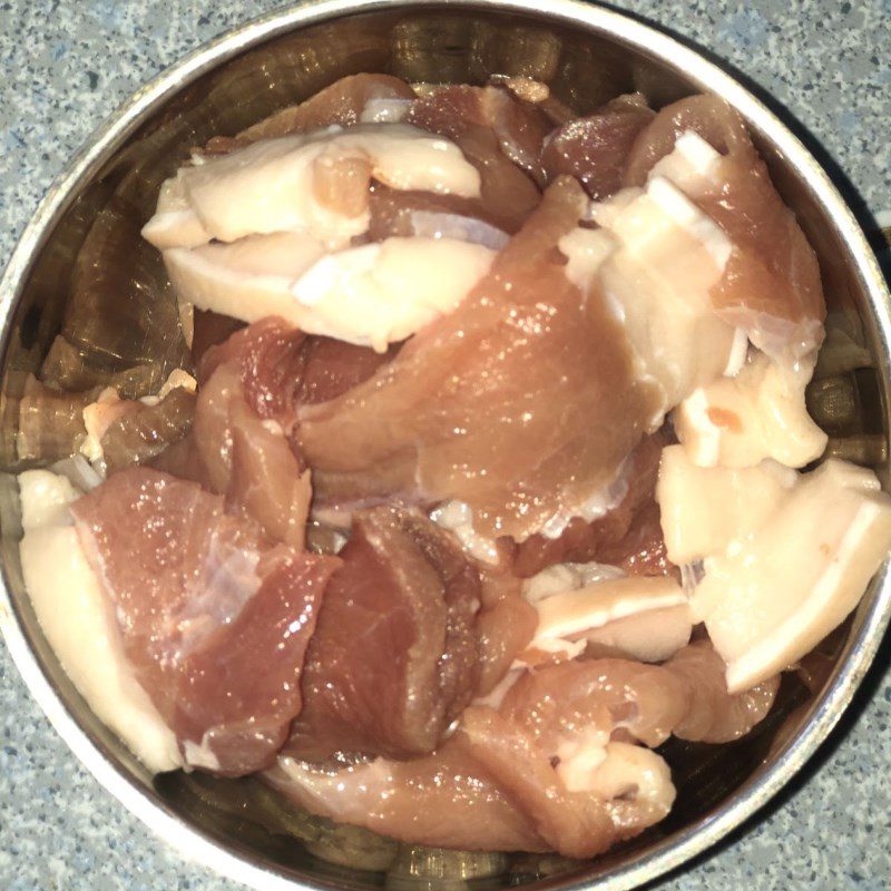 Step 1 Preparing the pork for Stir-fried Noodles with Mustard Greens and Pork