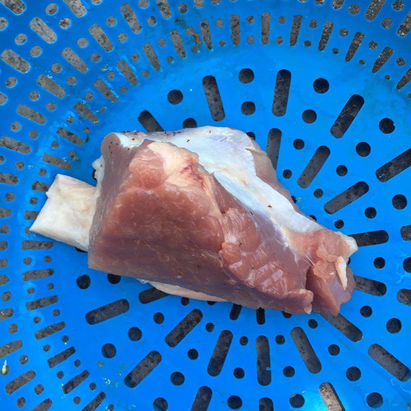 Step 1 Preparing the pork for Stir-fried Noodles with Mustard Greens and Pork