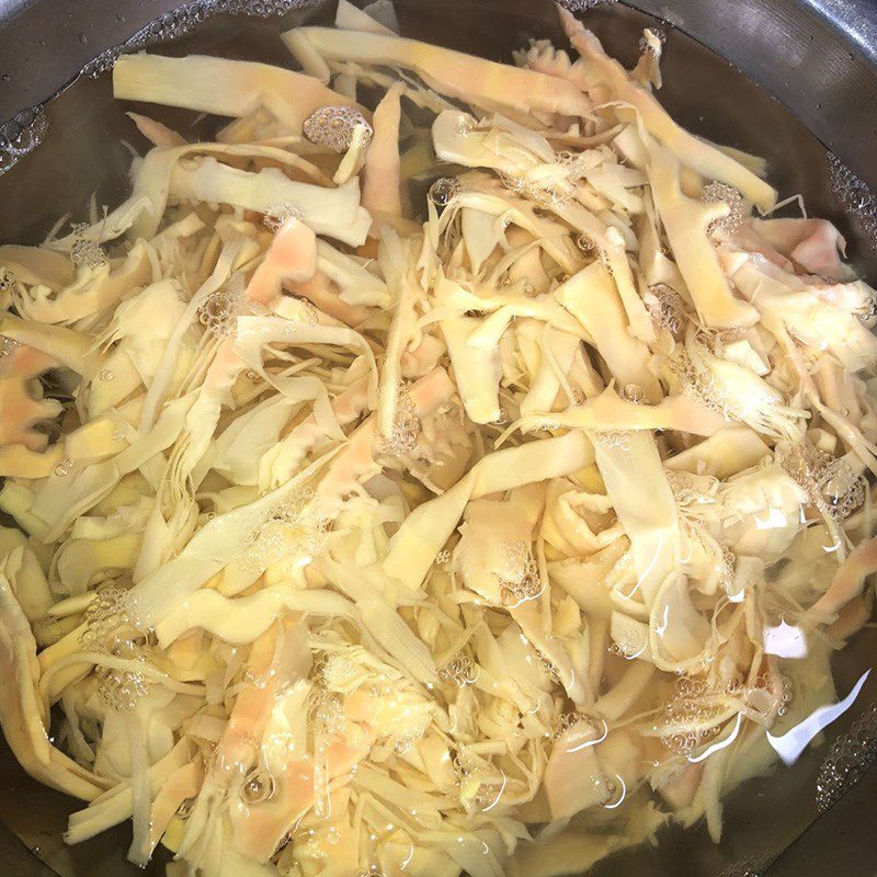 Step 1 Preparing and boiling bamboo shoots Fresh bamboo shoots stir-fried with pork