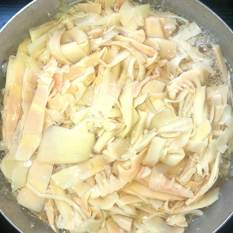 Step 1 Preparing and boiling bamboo shoots Fresh bamboo shoots stir-fried with pork