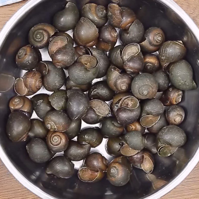 Step 1 Prepare and Boil Snails Stir-Fried Coconut Snails