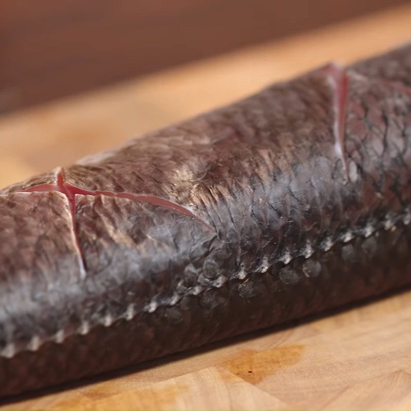 Step 1 Prepare and marinate the snakehead fish Steamed snakehead fish with soy sauce