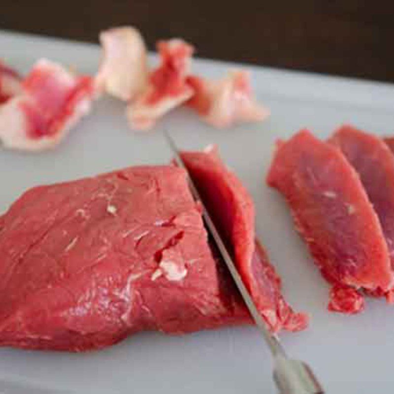 Step 1 Prepare and marinate beef Stir-fried papaya with beef