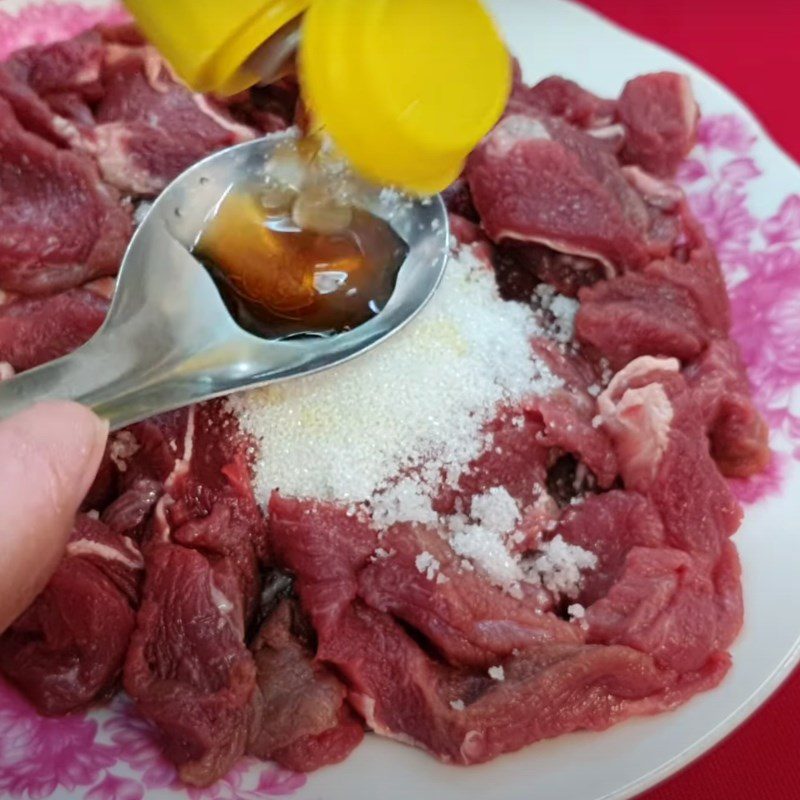 Step 1 Prepare and marinate buffalo meat Stir-fried Buffalo Meat with Bitter Melon