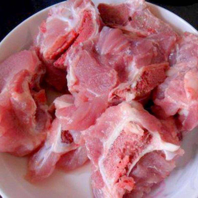 Step 1 Prepare the bones and other ingredients for Cabbage rolls with minced meat, pork bones, and carrots