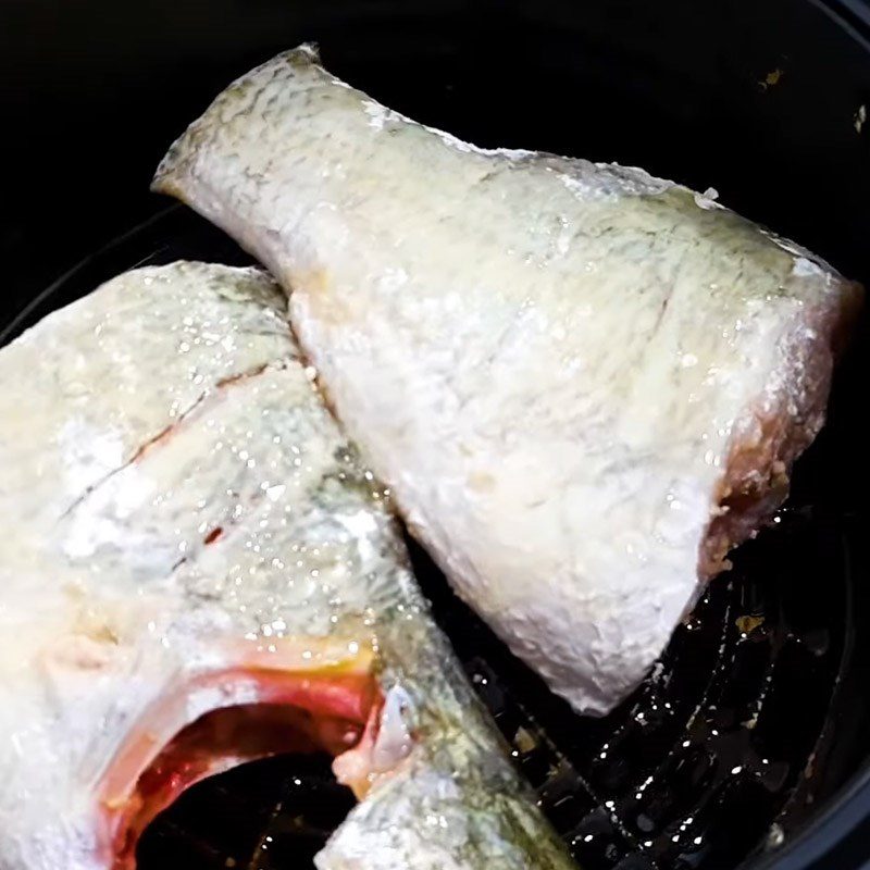 Step 2 Coat with flour and fry the barramundi Barramundi with passion fruit sauce