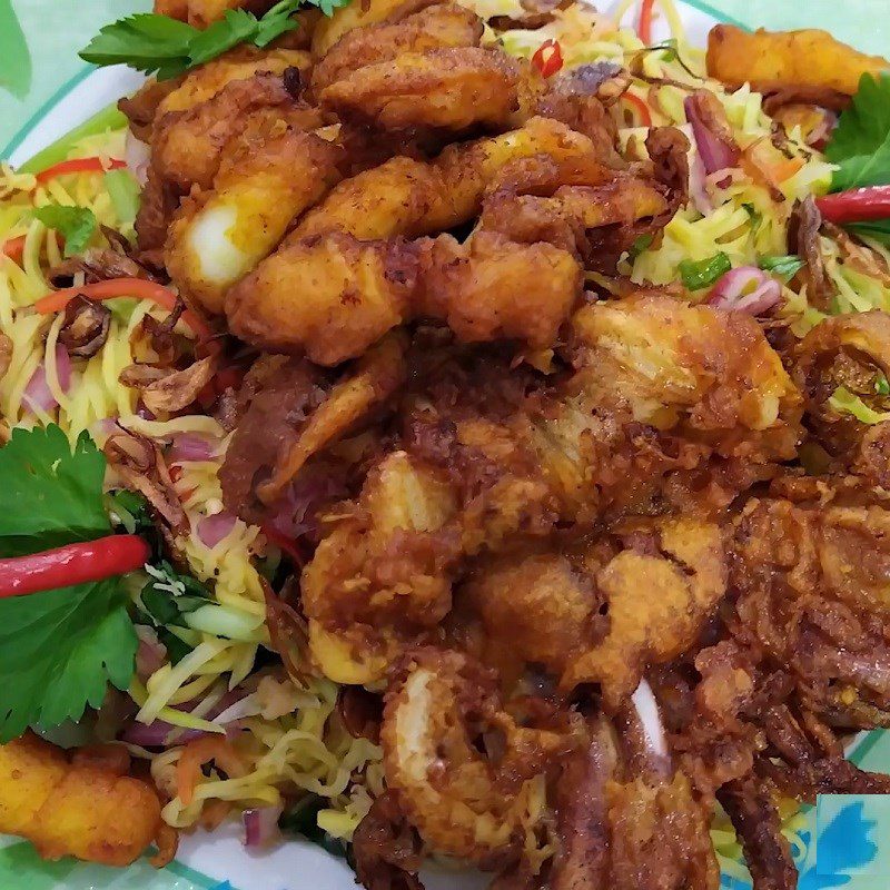 Step 7 Final Product Green mango salad crispy fried squid