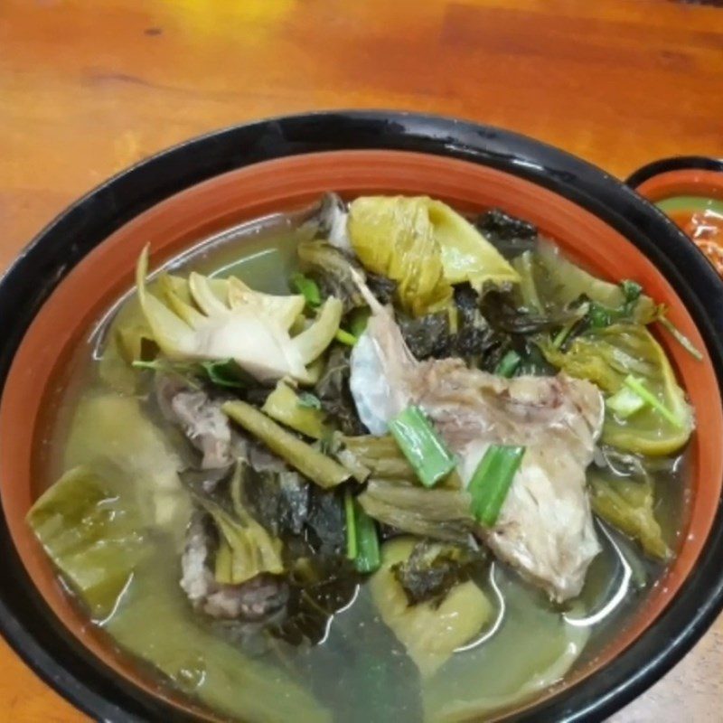 Step 5 Final product of sour fish soup with grouper head and pickled mustard greens