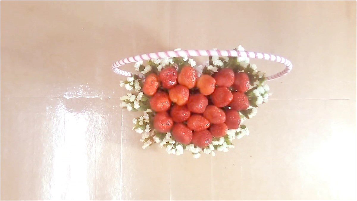 Arranging a strawberry bouquet