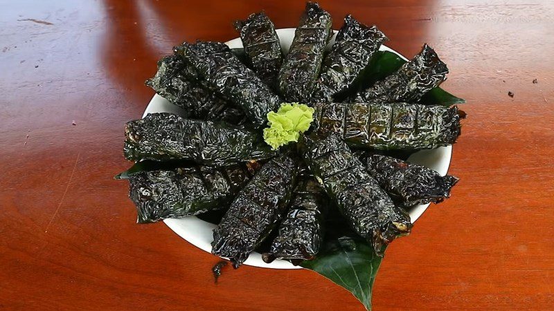 Grilled pork with wild betel leaves