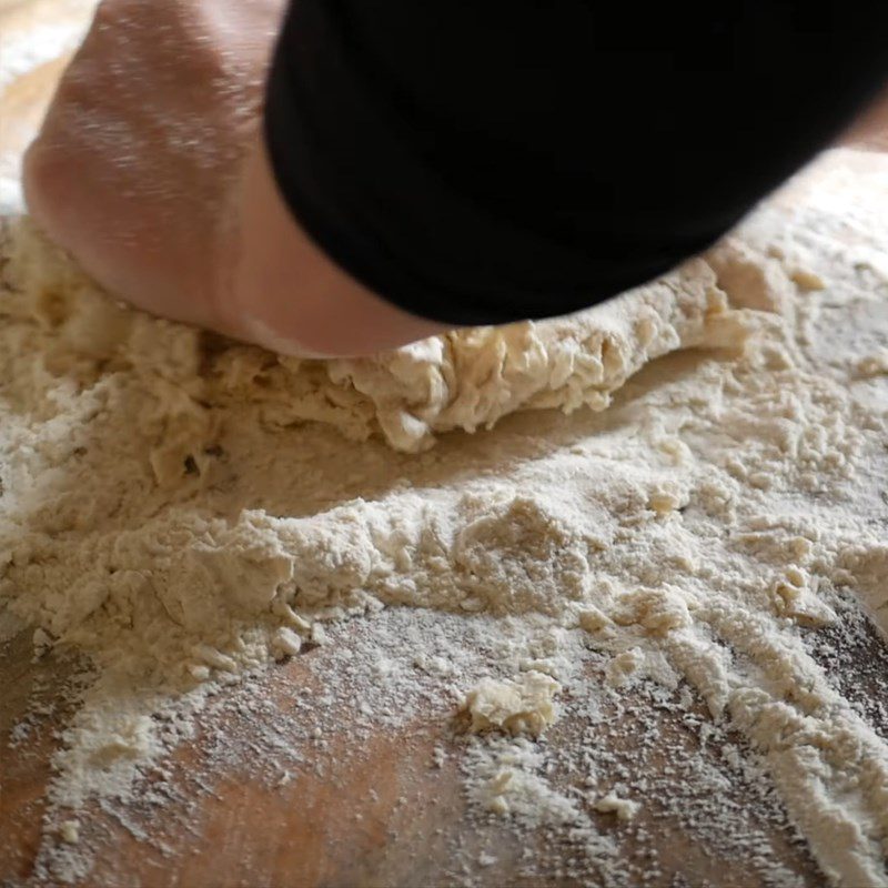 Step 1 Mixing the dough for cheese-filled ravioli with melted eggs