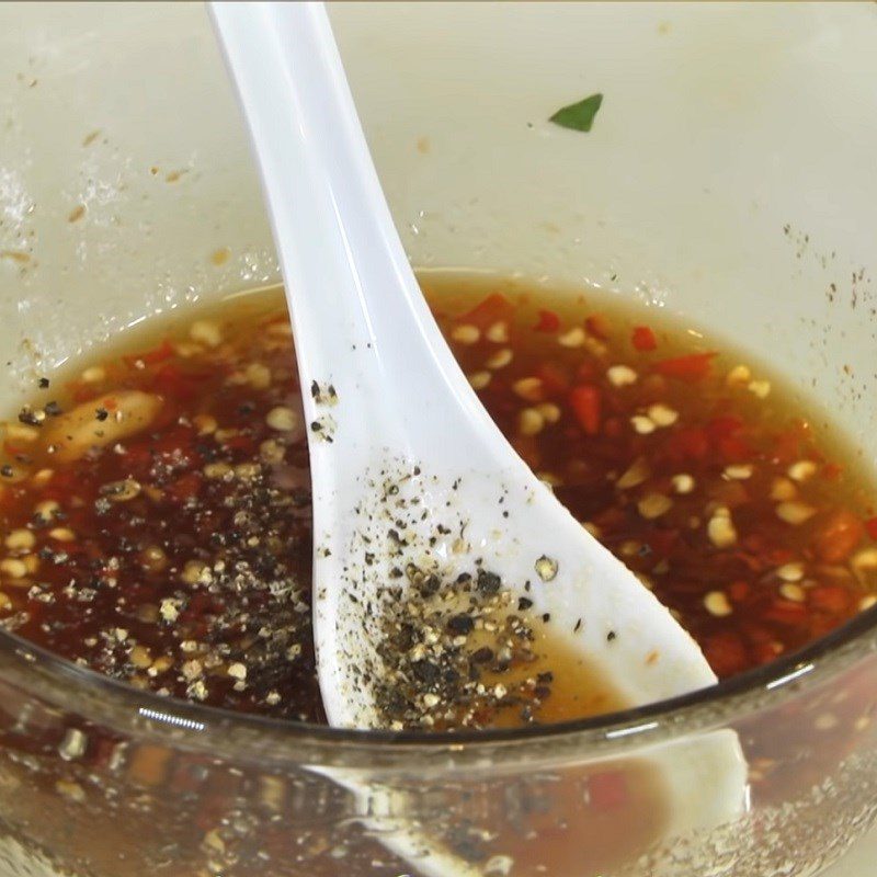 Step 4 Make the salad dressing Spicy grilled squid and green mango salad