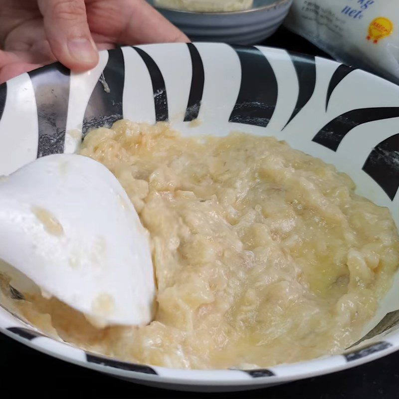 Step 1 Mix banana with butter and eggs for Banana Sponge Cake using a rice cooker