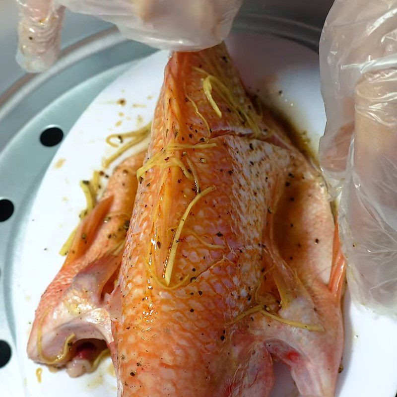 Step 3 Steaming fish Red tilapia steamed with five spices