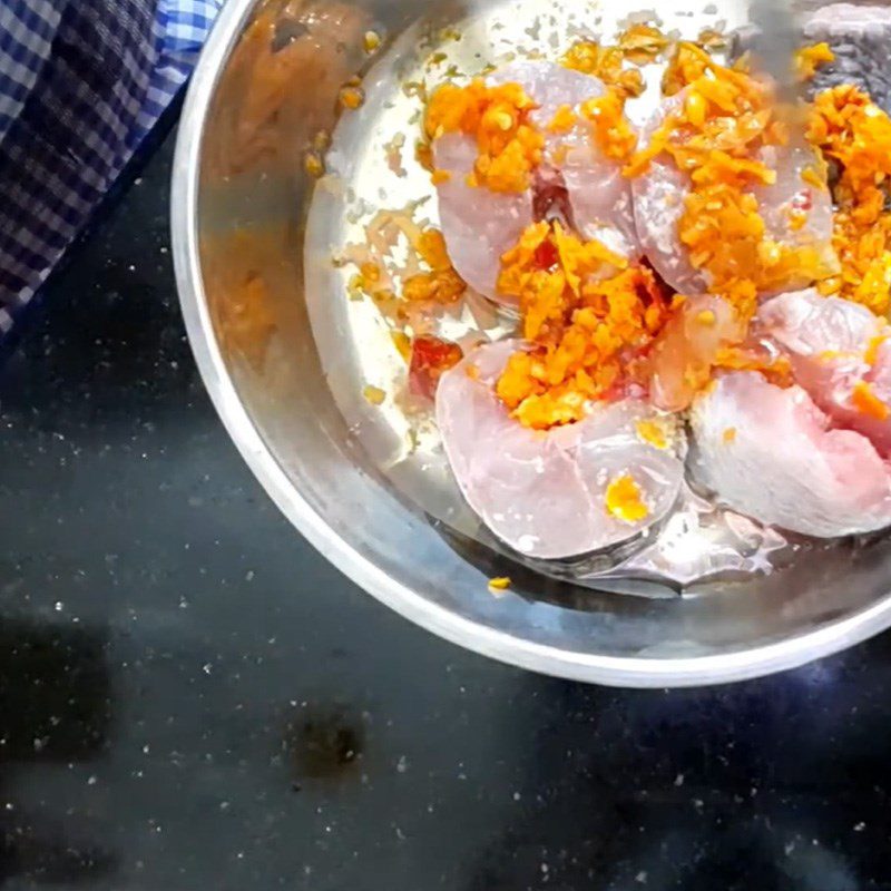 Step 2 Marinate fish Snakehead fish cooked with green bananas and turmeric