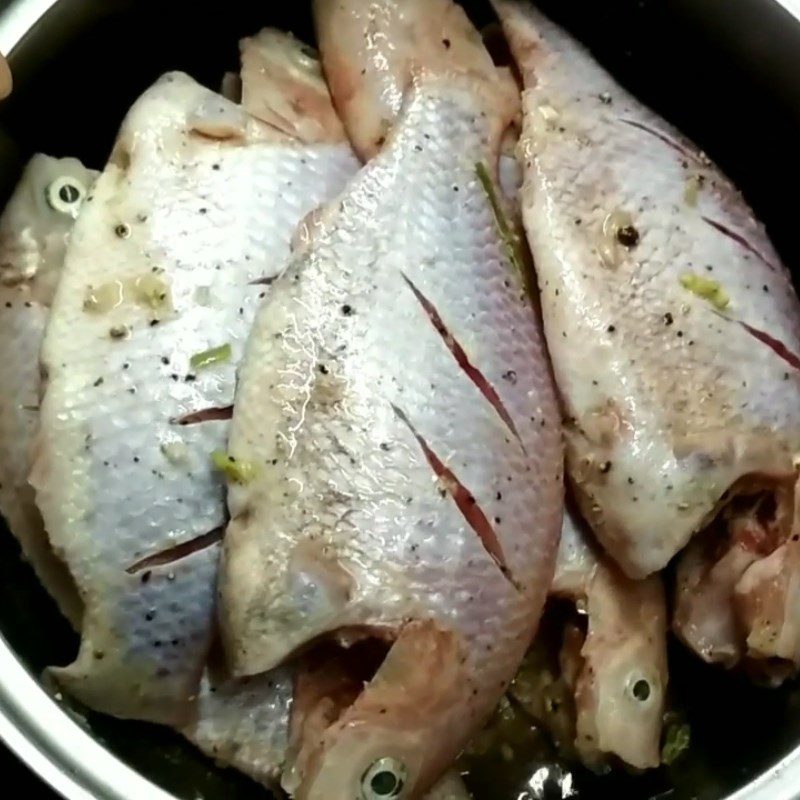 Step 2 Marinating the fish Grilled frogfish with salt and chili