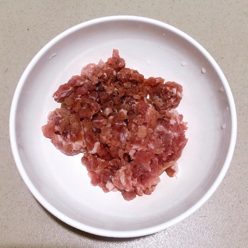 Step 2 Marinate and stir-fry meat Steamed bread with minced meat