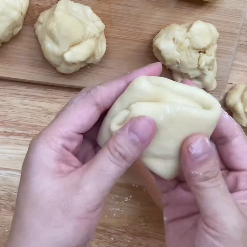 Step 6 Filling and Rolling the Dough for Layered Mooncake with Sticky Rice and Braised Meat