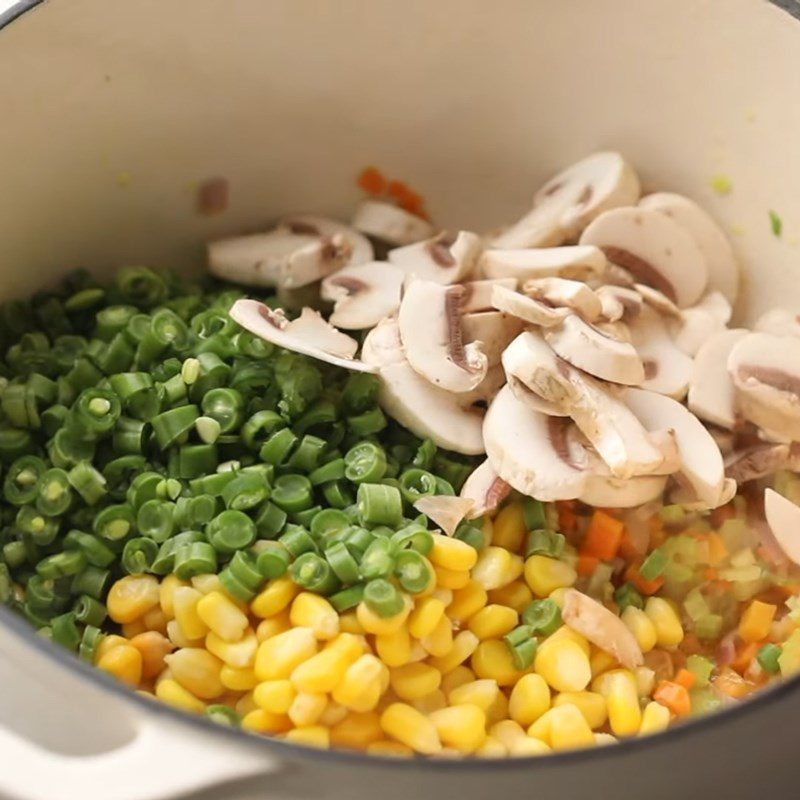 Step 2 Sauté the vegetables and mushrooms for Mixed Vegetable Cream Soup