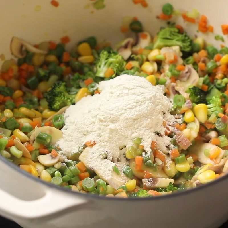 Step 2 Sauté the vegetables and mushrooms for Mixed Vegetable Cream Soup