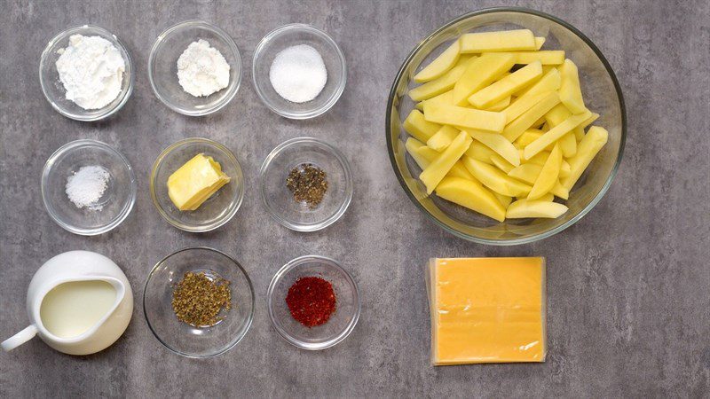 Ingredients for fried potatoes with cheese sauce